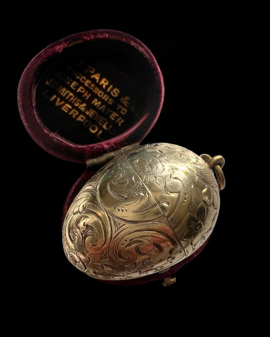 ANTIQUE SILVER GILDED EGG PENDANT
