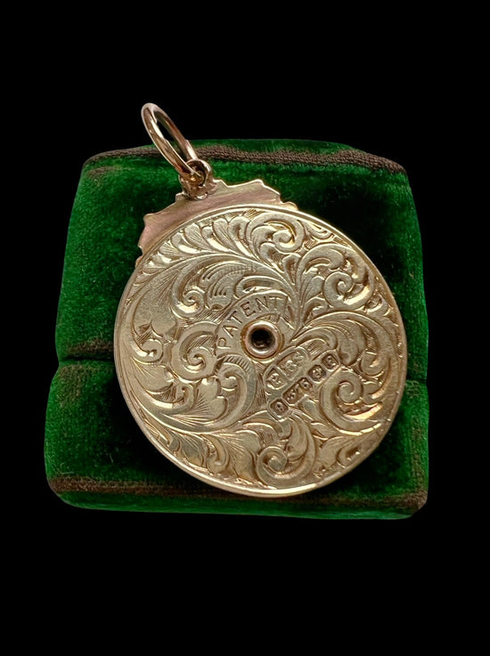 ANTIQUE PERPETUAL CALENDAR PENDANT