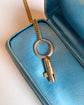 VICTORIAN 9CT GOLD BRAMAH KEY PENDANT