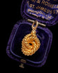 VICTORIAN 15CT GOLD KNOT PENDANT