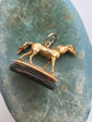19TH CENTURY FINELY MODELLED HORSE FOB PENDANT