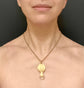 BALLOON CUFFED CELLULOID HAND PENDANT