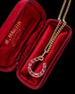 ANTIQUE NATURAL RUBY & 18CT GOLD HORSESHOE PENDANT