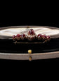 VICTORIAN DIAMOND HORSESHOE AND GARNET BROOCH