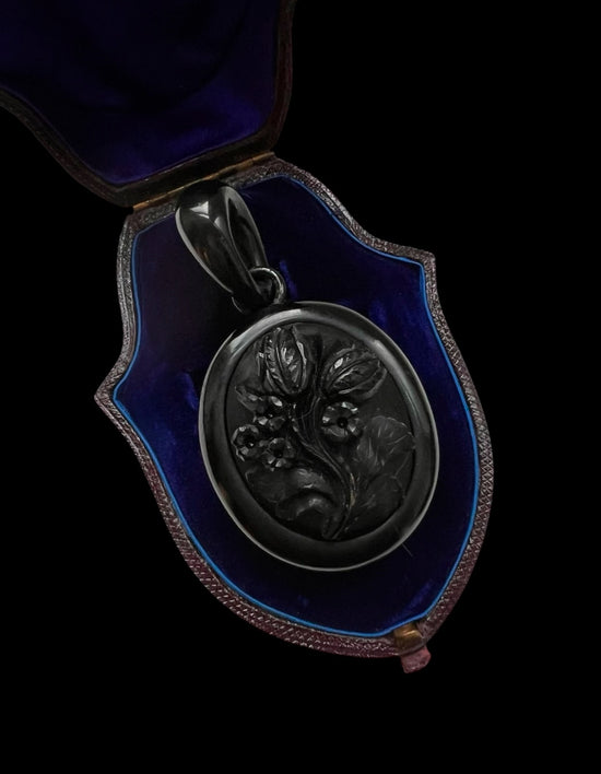LARGE WHITBY JET ‘TULIP’ LOCKET
