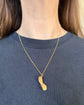 VICTORIAN 18CT GOLD HORSE LEG PENDANT