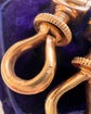 A PAIR OF ANTIQUE CHUNKY 18CT GOLD TWIST DOG CLIPS