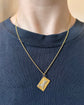 ANTIQUE PEARL & 15CT GOLD HORSE TOKEN PENDANT