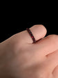 GEORGIAN FACETED GARNET ETERNITY RING