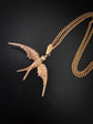 A 9CT GOLD & PEARL SWALLOW PENDANT