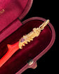 ANTIQUE 15CT GOLD SNAKE & CORAL PENDANT