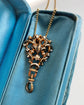 19TH CENTURY SWISS ENAMEL BAIL WITH TWIST DOGCLIP