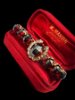VICTORIAN DIAMOND HORSESHOE AND GARNET BROOCH