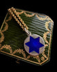 20TH CENTURY BLUE GUILLOCHE STAR PENDANT