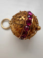 19TH CENTURY FRENCH 18CT GOLD & RUBY SPHERE PENDANT