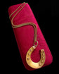 VICTORIAN 15CT GOLD HORSESHOE PENDANT ‘SLOW RACE’