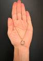 VICTORIAN EMERALD & DIAMOND HORSESHOE PENDANT