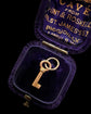 ANTIQUE MINIATURE GOLD KEY PENDANT
