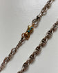 GEORGIAN HIGH CARAT GOLD HAND WITH SNAKE PENDANT