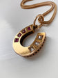 VICTORIAN RUBY & DIAMOND 15CT GOLD HORSESHOE PENDANT