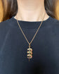 ANTIQUE TRIPLE HORSESHOE & NAIL PENDANT