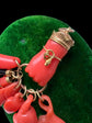 19TH CENTURY CORAL HAND PENDANT