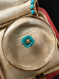 VICTORIAN GLASS LOCKET WITH PANSY FLOWER CENTRE & TURQUOISE BAIL