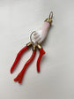 19TH CENTURY CORAL HAND WITH AMULETS