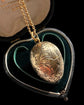 ANTIQUE SILVER GILDED EGG PENDANT