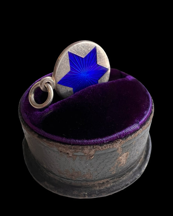 20TH CENTURY BLUE GUILLOCHE STAR PENDANT