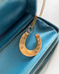 VICTORIAN 15CT GOLD HORSESHOE PENDANT ‘SLOW RACE’