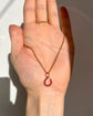 ANTIQUE NATURAL RUBY & 18CT GOLD HORSESHOE PENDANT