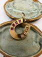 VICTORIAN RUBY & DIAMOND 15CT GOLD HORSESHOE PENDANT