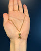GEORGIAN HIGH CARAT GOLD HAND WITH SNAKE PENDANT