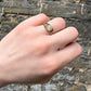 19TH CENTURY DIAMOND RING WITH BLACK ENAMEL SCROLL BAND