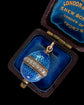 EARLY 20TH CENTURY ENAMEL & DIAMOND EGG PENDANT
