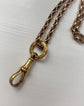 VICTORIAN 9CT DOGCLIP WITH ORIGINAL CHASED BAIL