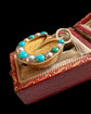 VICTORIAN 15CT GOLD & TURQUOISE HORSE HOOF PENDANT