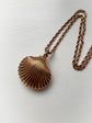 EARLY VICTORIAN 15CT GOLD SHELL LOCKET