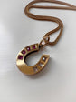 VICTORIAN RUBY & DIAMOND 15CT GOLD HORSESHOE PENDANT