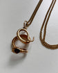 VICTORIAN 15CT GOLD & GARNET COILED SNAKE PENDANT
