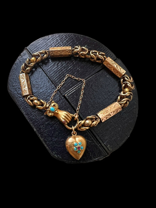GEORGIAN 15CT GOLD BRACELET WITH A GEM SET HAND, SNAKE & HEART CLASP