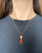 EARLY 19TH CENTURY CORAL HAND PENDANT
