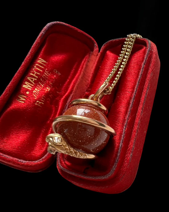 VICTORIAN 15CT GOLD COILED SNAKE & GOLDSTONE SPHERE PENDANT