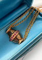 19TH CENTURY RUBY & ENAMEL 18CT GOLD SLIDER PENDANT