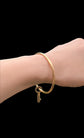 ANTIQUE 15CT GOLD BRAMAH KEY BANGLE