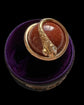VICTORIAN 15CT GOLD COILED SNAKE & GOLDSTONE SPHERE PENDANT