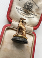 EARLY 19TH CENTURY 18CT GOLD & LAPIS DOG FOB PENDANT
