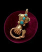 GEORGIAN HIGH CARAT GOLD HAND WITH SNAKE PENDANT
