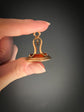 GEORGIAN HIGH CARAT GOLD FOB PENDANT WITH DOG INTAGLIO